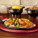 Lodge LFSR3 Cast Iron Fajita Set, Pre-Seasoned | $15 | Amazon